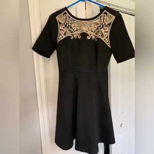 Black dress with gold detail